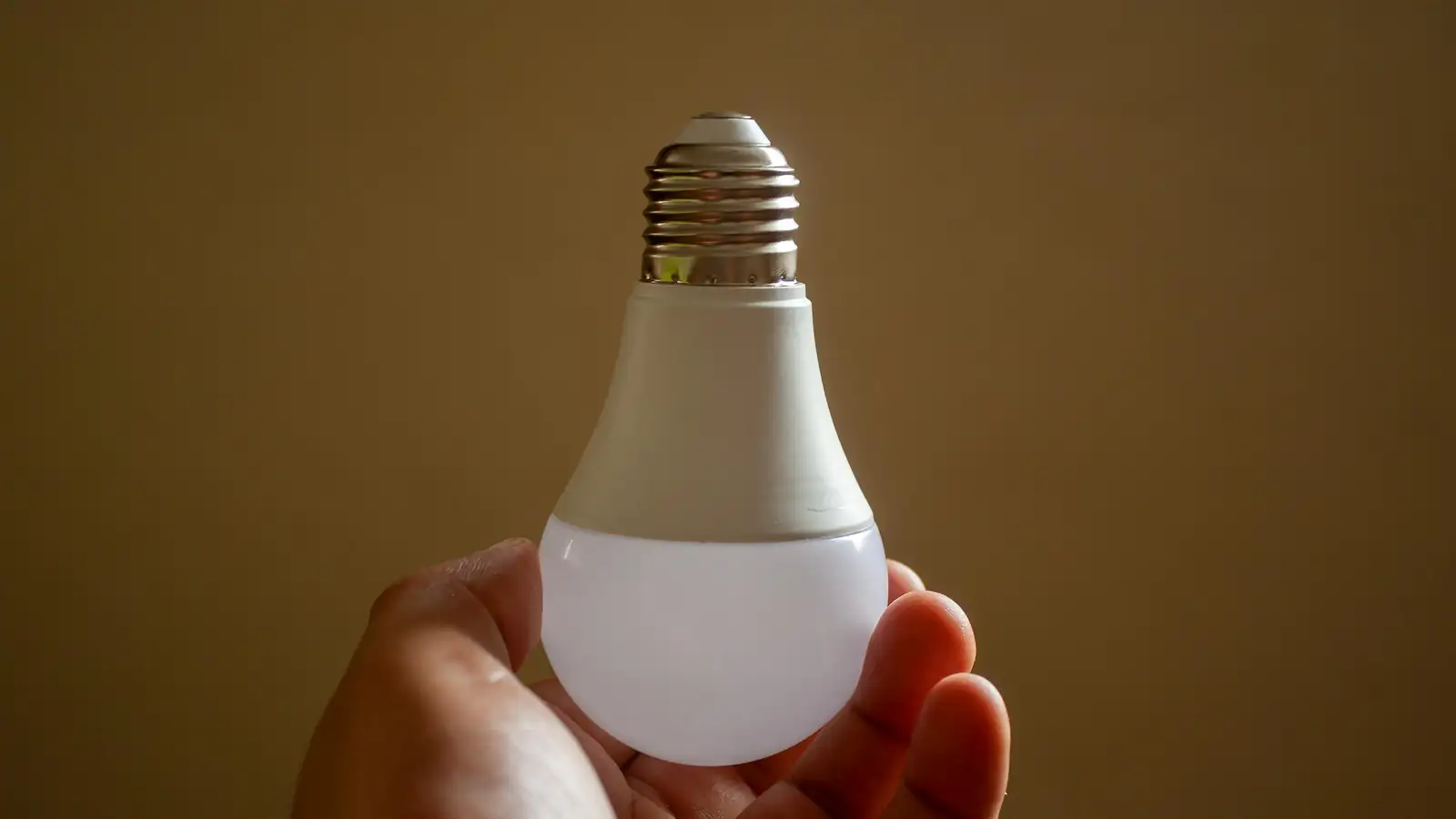 Smart LED bulbs glowing in different colors